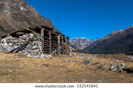 Stone shelter in the Yumthang valley surrounded by rocky mountains - Sikkim India.