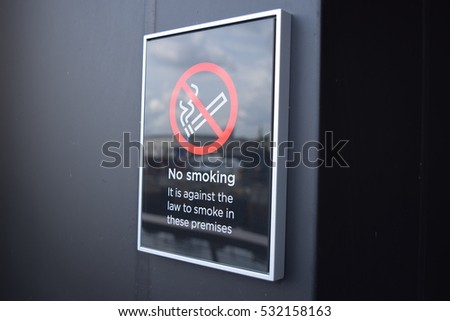 Black no smoking sign on the wall
