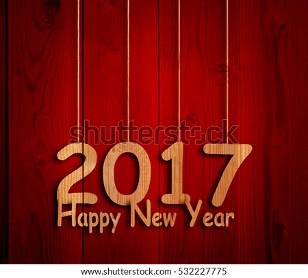 Concept or conceptual old wood or wooden red vintage horizontal December background with 2017 Happy New Year message or greeting, metaphor to holiday, winter, festive, future, hope, wishes, eve design
