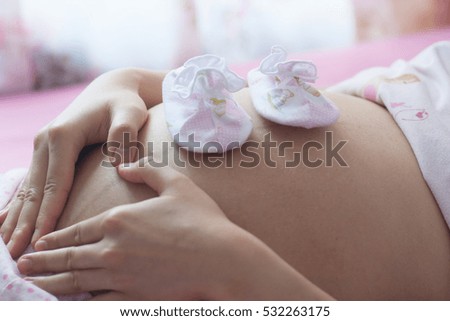 caption on belly pregnart