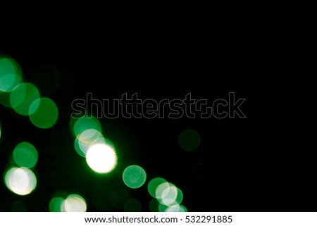 Bokeh green on a black background. abstract background blue bokeh