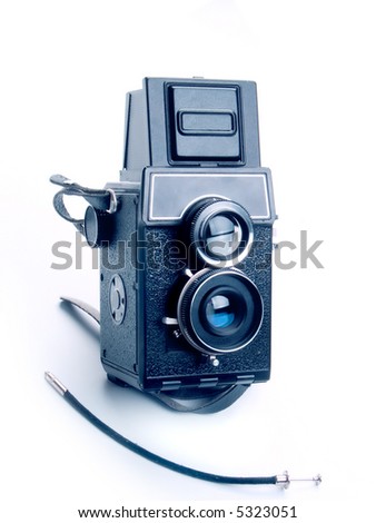 Vintage photo camera on white
