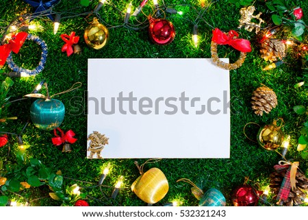 Christmas day on green grass and copy space. Morning sunshine day and good day.Happy time together in winter season.Textures background top view.