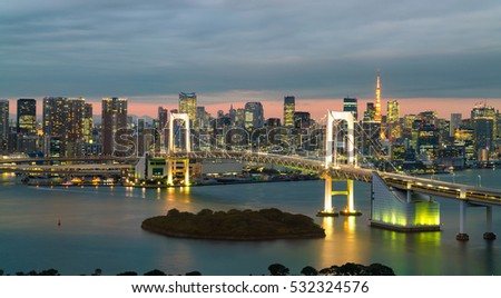 Tokyo skyline with Tokyo tower and rainbow bridge. Tokyo, Japan.
