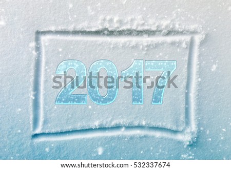 hand drawn square shape in the fresh snow, blue gradient tone and snowfall effect with word 2017