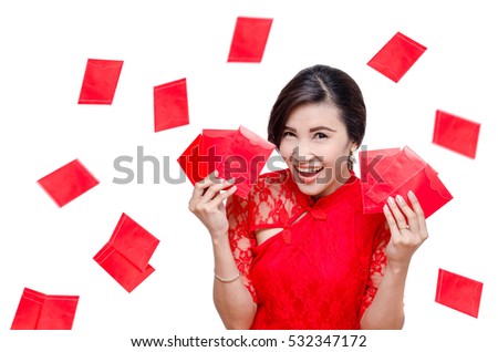 Beautiful Asian woman in traditional chinese costume holding red packet money