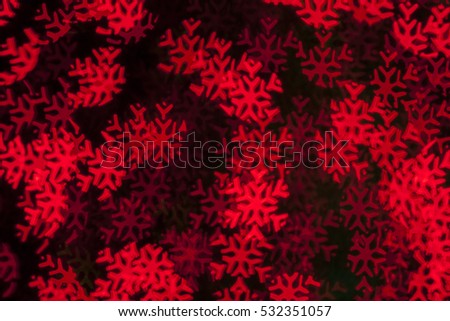 Christmas background. Festive elegant abstract background with bokeh lights and stars,snowflake in red color concept