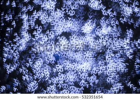 Christmas background. Festive elegant abstract background with bokeh lights and stars,snowflake concept