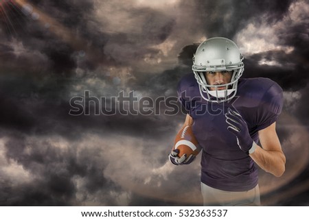 3D Portrait of American football player running with ball against gloomy sky
