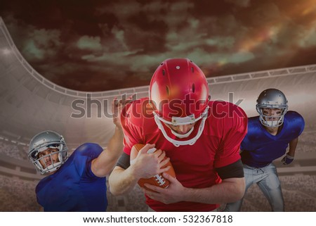 3D American football players against dark cloudy sky with beach