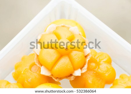 Thai dessert called Khanom Jarmongkut, or sweetmeat in crown-shaped made of flour, egg, and sugar, use in marriage ceremonies.