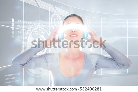 3D Young woman using virtual video glasses against futuristic technology interface