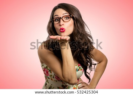 Quirky cute girl female blowing kisses unique fun personality glasses girl next door