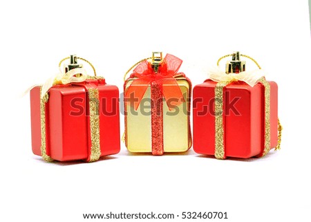 Christmas decorations box gold and red on white background