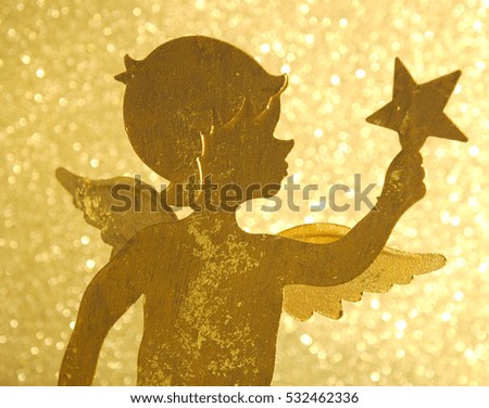 Angel holding star