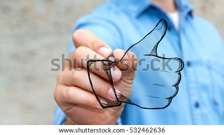 Businessman on blurred background drawing thumb up illustration with a pen