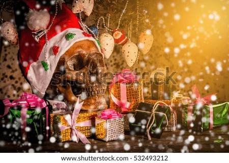 Still Life with human Skull in chrismas day on old wooden background
