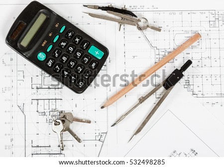 Architect workplace top view. Architectural project, blueprints, calculator, keys, divider compass and pencil on desk table. Real Estate Concept.