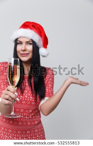 Brunette in dress with champagne