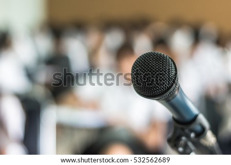 Microphone speaker in seminar classroom, lecture hall or conference meeting in educational business event for host, teacher, or coaching mentor  Royalty-Free Stock Photo #532562689