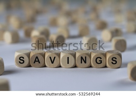savings - cube with letters, sign with wooden cubes