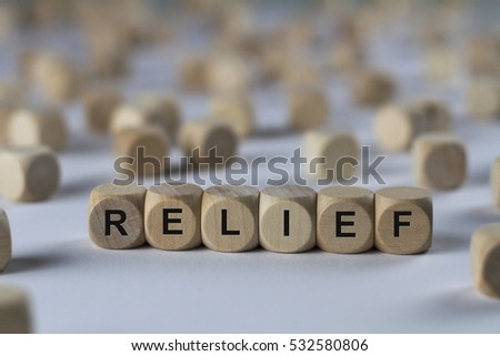 relief - cube with letters, sign with wooden cubes