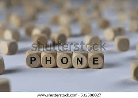 phone - cube with letters, sign with wooden cubes