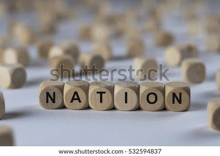 nation - cube with letters, sign with wooden cubes