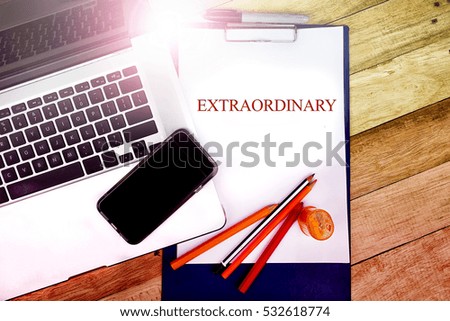  Extraordinary word text write at notepad in wooden background