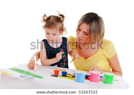 a young mom and her little daughter paint colors in this album
