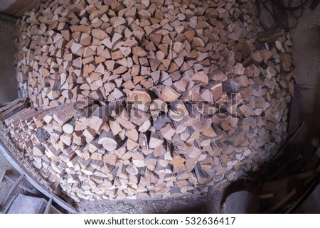 Firewood in an old barn