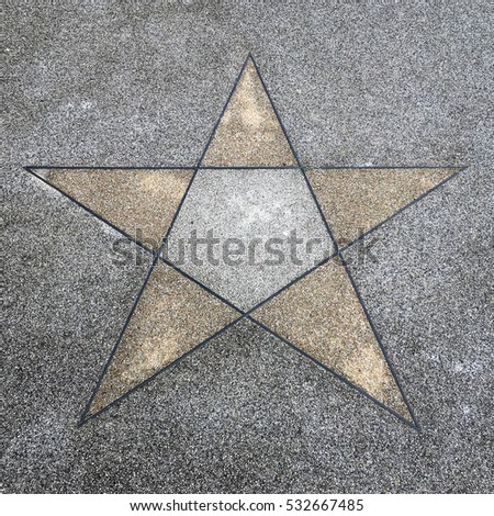 Star symbol on cement floor background. star symbol on concrete pattern background.