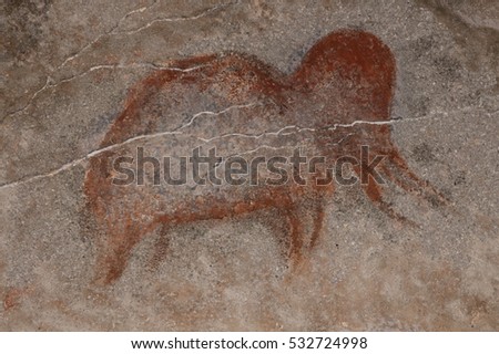 Mammoth picture ocher on the cave wall, rock. ancient Stone Age man.