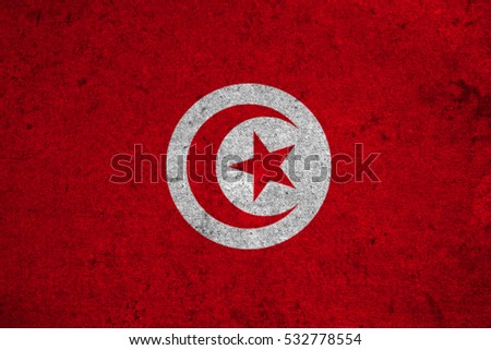 Tunisia flag on an old grunge background
