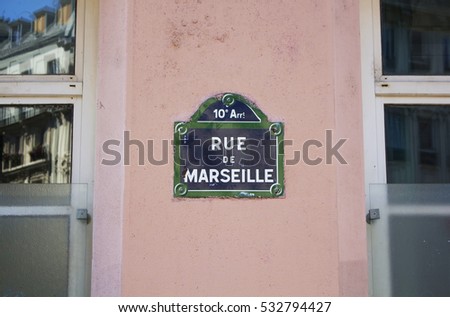 View of street sign (Rue De Marseille) in Paris.