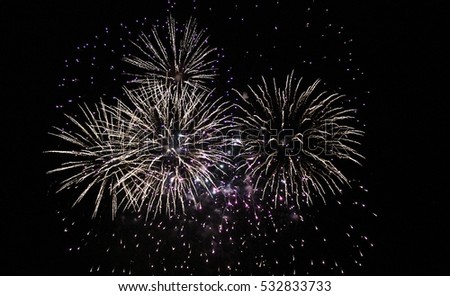 Fireworks light up the sky with dazzling display celebration  New years eve congratulations event. stock, photo, photograph, picture, image