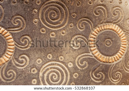 Abstract brown curly spiral circle pattern texture