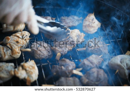 Pieces of meat on the grill