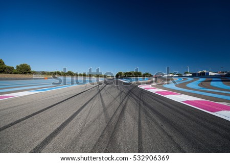 Race track. Tire tracks Royalty-Free Stock Photo #532906369