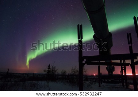 Alaska Pipeline with the Northern Lights