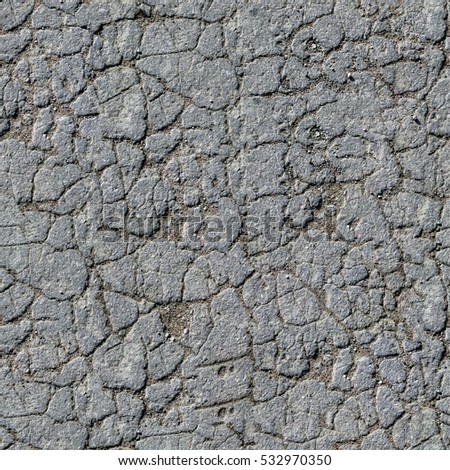 Seamless texture of cracked asphalt.