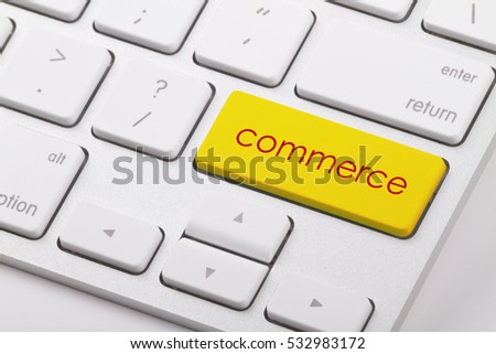 Commerce word written on computer keyboard.