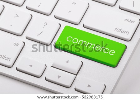 Commerce word written on computer keyboard.