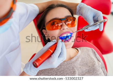 Beautiful girl in dentistry