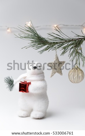 Polar bear winter with christmas tree and christmas decorations on white background