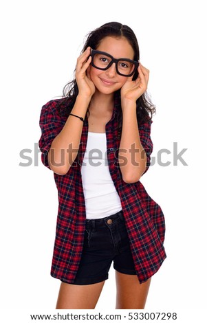 Studio shot of young beautiful Caucasian teenage girl isolated against white background