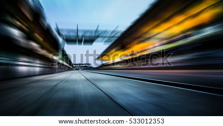 Motion blurred racetrack Royalty-Free Stock Photo #533012353