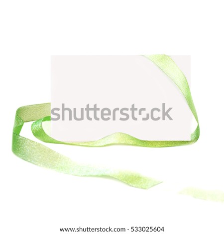 Greeting white card with green ribbon. Celebration. White background.