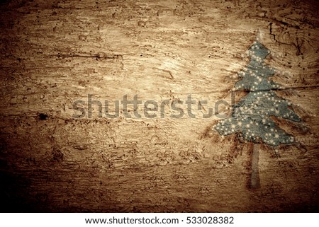 Christmas wooden background, fir tree on old wooden background , blank space.
