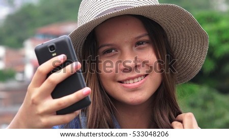 Adorable Teen Girl Making Selfies